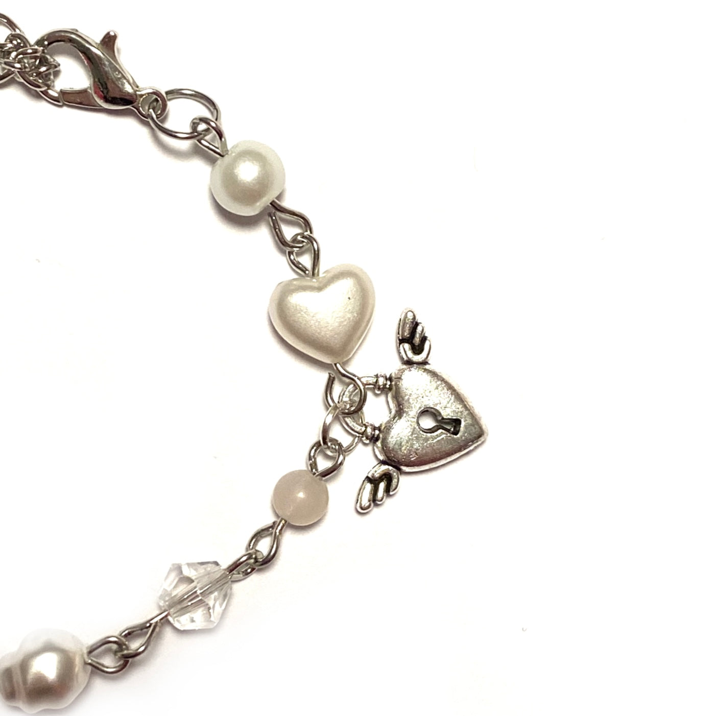 Bracelet with Rose quartz, Charms and Beads