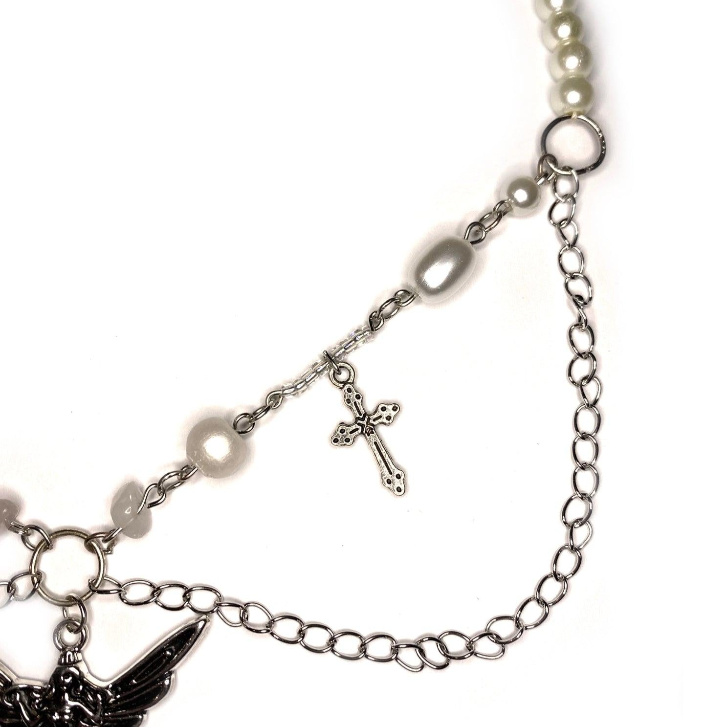 Close-up of Fairy Necklace with Cross Right side