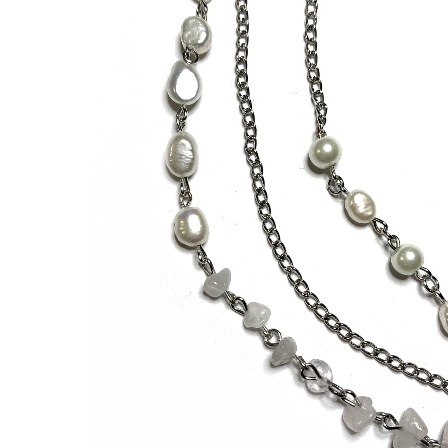 Kralen en stenen van klok ketting dichtbij