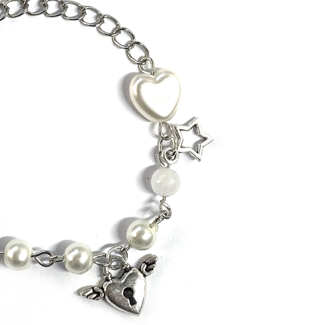 Bracelet with hearts, Gemstones, Pearls and Charms