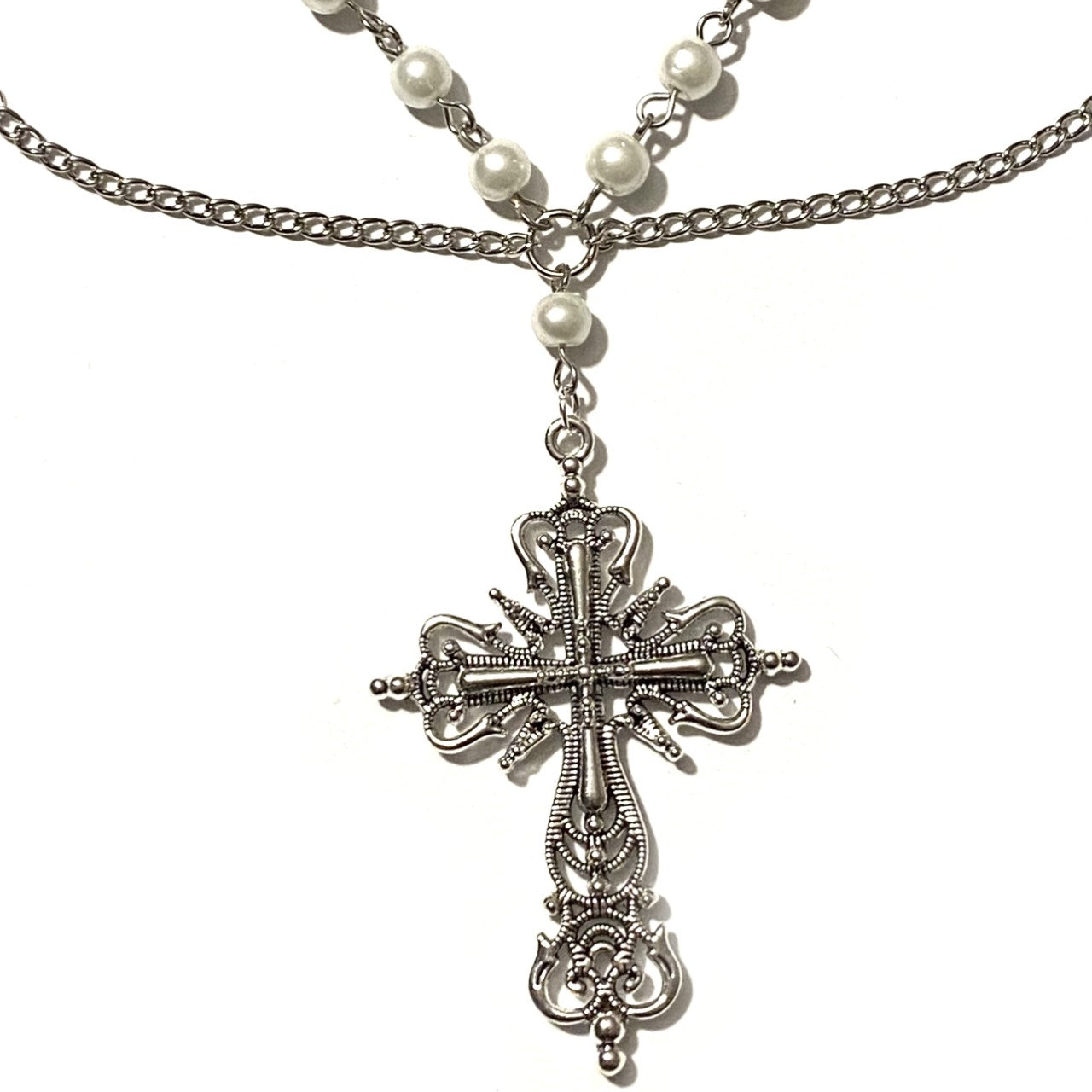 Necklace with White Pearls and a Silver Cross