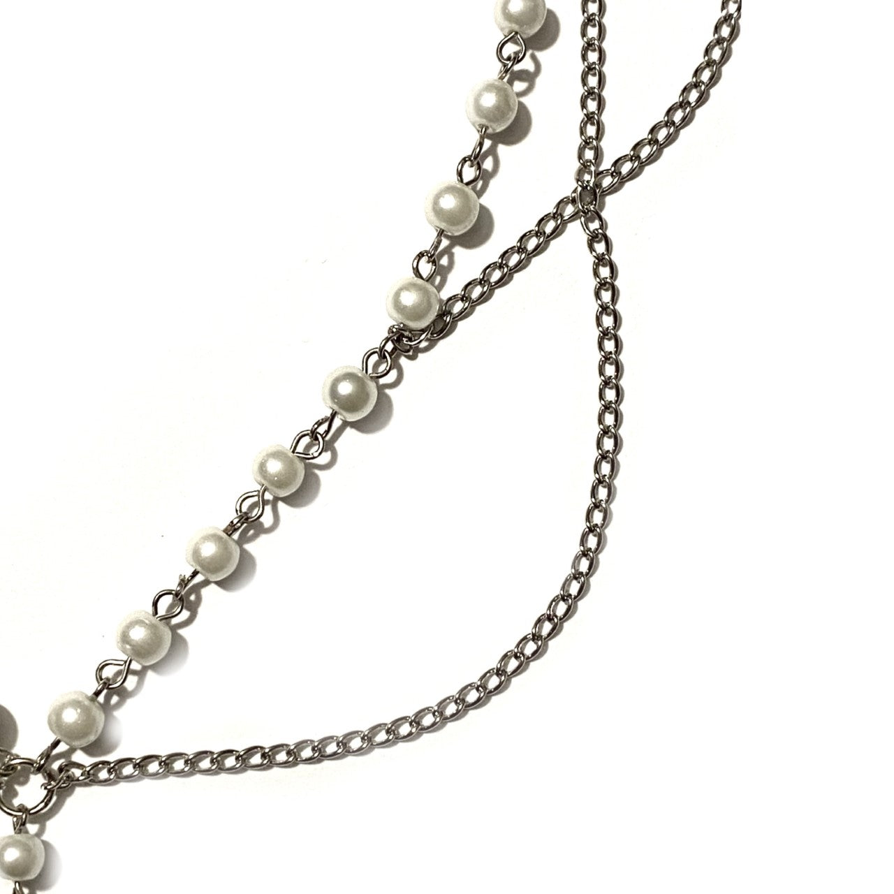 Necklace with White Pearls and a Silver Cross