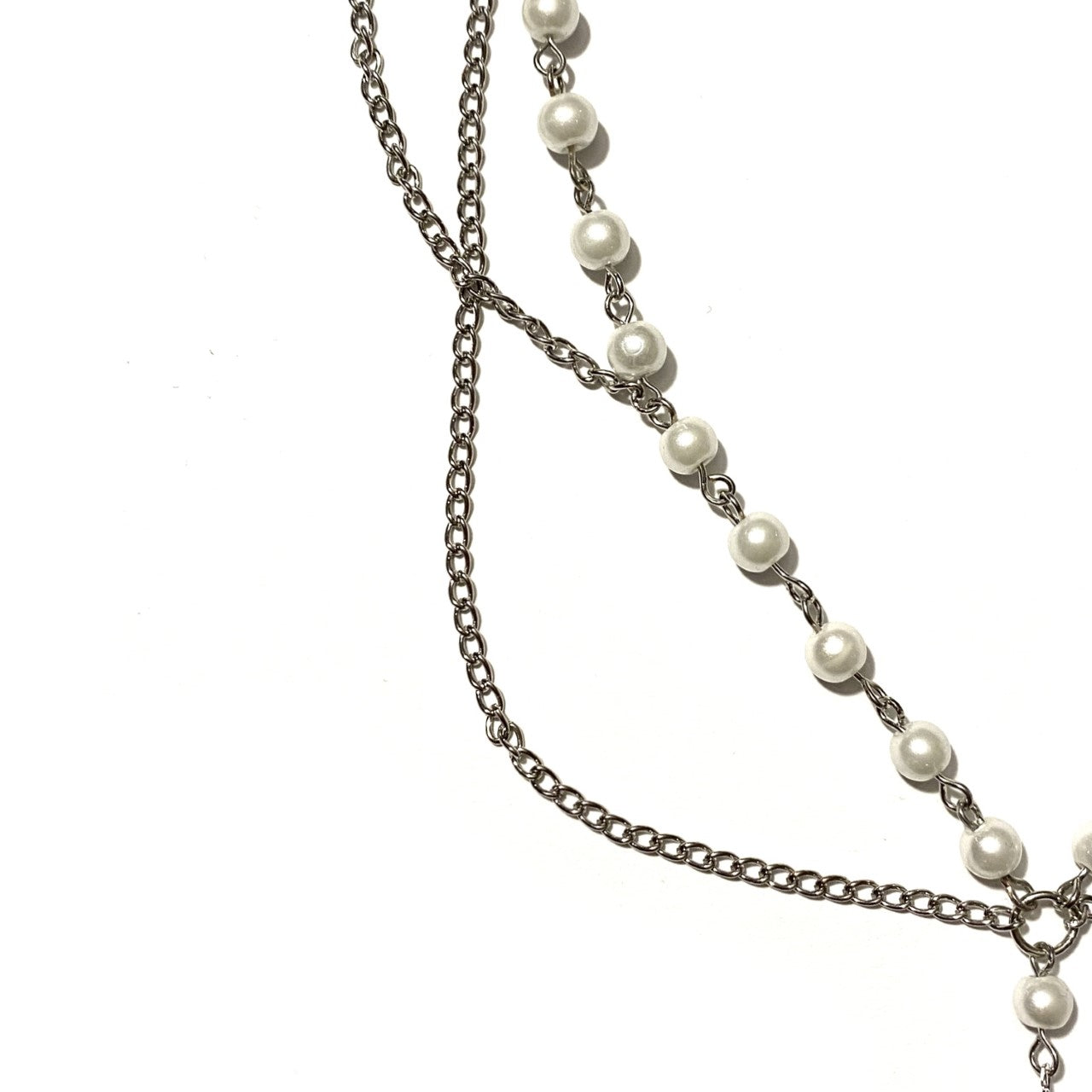 Necklace with White Pearls and a Silver Cross