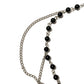 Necklace with black beads and cross