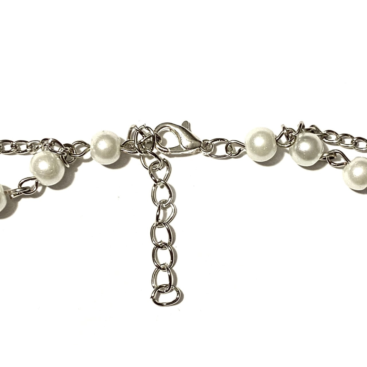 Necklace with White Pearls and a Silver Cross